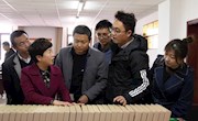 西峰区档案局（档案馆）考察组来宁县考察学习精准扶贫档案整理工作 